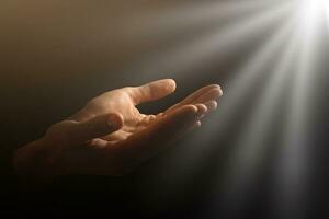 Man hands praying in dark background photo