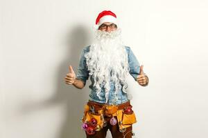 Santa with construction tools, santa repairman photo