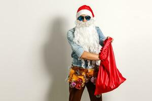 Santa with construction tools, santa repairman photo