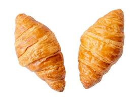 Top view of two separated fresh croissants isolated on white background with clipping path. Set or collection of croissants photo