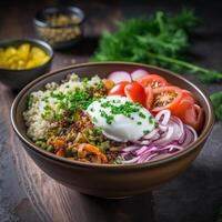 vegan salad with fresh ingredients in a plate and pepper on black cutting board photo