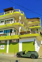 Puerto Escondido Oaxaca Mexico 2023 Typical beautiful colorful tourist street sidewalk city Puerto Escondido Mexico. photo