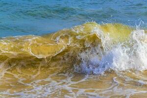 Waves at tropical beach caribbean sea clear turquoise water Mexico. photo