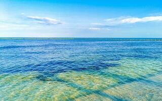 Tropical mexican beach clear turquoise water Playa del Carmen Mexico. photo