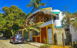 Puerto Escondido Oaxaca Mexico 2023 Typical beautiful colorful tourist street sidewalk city Puerto Escondido Mexico. photo