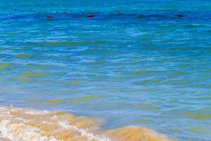 Waves at tropical beach caribbean sea clear turquoise water Mexico. photo