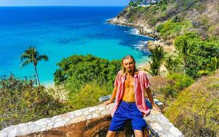 Selfie rocks cliffs view waves Carrizalillo beach Puerto Escondido Mexico. photo