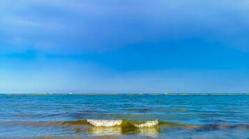 Tropical mexican beach clear turquoise water Playa del Carmen Mexico. photo