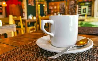 Cup of americano black coffee in restaurant cafe in Mexico. photo