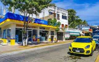 Puerto Escondido Oaxaca Mexico 2023 Typical beautiful colorful tourist street sidewalk city Puerto Escondido Mexico. photo