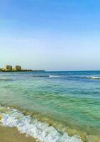 Tropical mexican beach clear turquoise water Playa del Carmen Mexico. photo