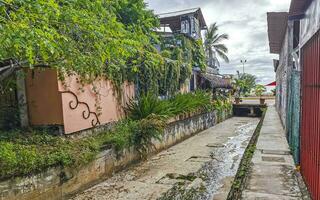 Open sewerage system in the tropical jungle mountains Mexico. photo