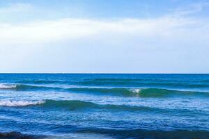 Waves at tropical beach caribbean sea clear turquoise water Mexico. photo