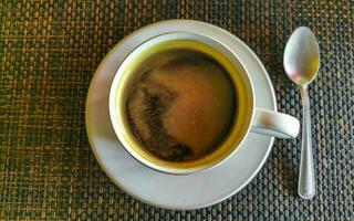 Cup of americano black coffee in restaurant cafe in Mexico. photo
