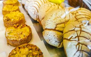 Bread rolls baguettes cakes and other pastries in Mexico. photo