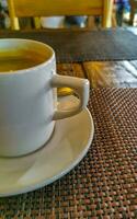 Cup of americano black coffee in restaurant cafe in Mexico. photo