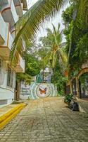 Puerto Escondido Oaxaca Mexico 2023 Typical beautiful colorful tourist street sidewalk city Puerto Escondido Mexico. photo