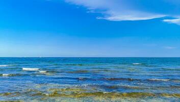 Tropical mexican beach clear turquoise water Playa del Carmen Mexico. photo