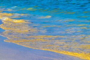 Waves at tropical beach caribbean sea clear turquoise water Mexico. photo