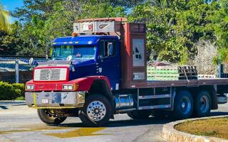 Puerto Escondido Oaxaca Mexico 2023 Blue and red old mexican truck transporter delivery car Mexico. photo