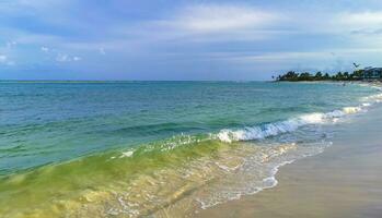 Tropical mexican beach clear turquoise water Playa del Carmen Mexico. photo