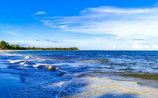 Tropical mexican beach clear turquoise water Playa del Carmen Mexico. photo