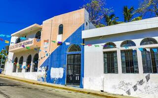 Puerto Escondido Oaxaca Mexico 2023 Typical beautiful colorful tourist street sidewalk city Puerto Escondido Mexico. photo