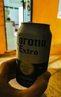 Playa del Carmen Quintana Roo Mexico 2023 Corona beer can in the hand Playa del Carmen Mexico. photo