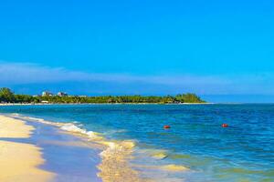 Tropical mexican beach clear turquoise water Playa del Carmen Mexico. photo