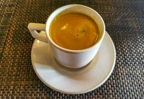 Cup of americano black coffee in restaurant cafe in Mexico. photo