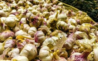 Buy fresh garlic in the supermarket in Mexico. photo