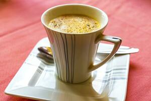 Cup with black coffee in resort Rasdhoo Atoll island Maldives. photo