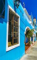 Puerto Escondido Oaxaca Mexico 2023 Typical beautiful colorful tourist street sidewalk city Puerto Escondido Mexico. photo