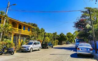 Puerto Escondido Oaxaca Mexico 2023 Typical beautiful colorful tourist street sidewalk city Puerto Escondido Mexico. photo