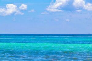 Tropical mexican beach clear turquoise water Playa del Carmen Mexico. photo