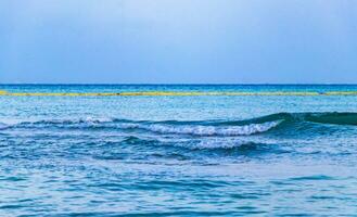 Waves at tropical beach caribbean sea clear turquoise water Mexico. photo