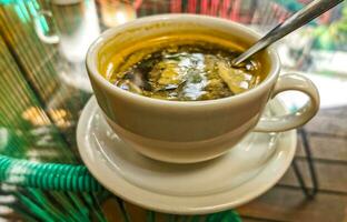 Cup of americano black coffee in restaurant cafe in Mexico. photo