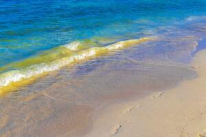 Waves at tropical beach caribbean sea clear turquoise water Mexico. photo