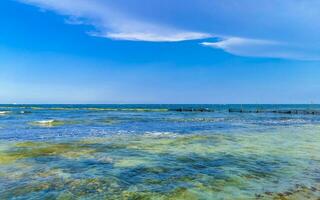 Tropical mexican beach clear turquoise water Playa del Carmen Mexico. photo