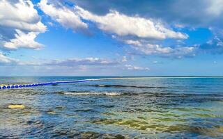 Tropical mexican beach clear turquoise water Playa del Carmen Mexico. photo