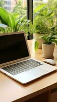 Desk with notepad and pen next to keyboard photo