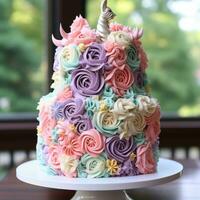 Whimsical unicorn cake with rainbow layers photo