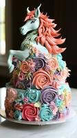 Whimsical unicorn cake with rainbow layers photo