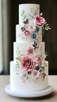 Simple white cake with watercolor florals photo