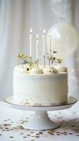 Minimalist white cake with gold happy birthday topper photo