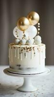 Minimalist white cake with gold happy birthday topper photo