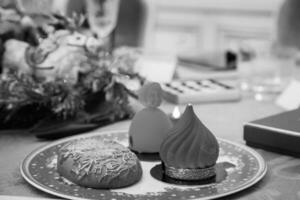 Sweet beautiful dessert cupcake lay on porcelain plate photo