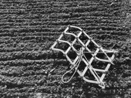 Plowed field for potato in brown soil on open countryside nature photo