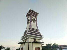 Tanah Grogot Kalimantan Timur, Indonesia 27 August 2023. a giant wall clock building Kalimantan timur, Indonesia, tanah Grogot photo