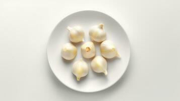 Photo of Garlics on minimalist plate isolated on white background. generative ai